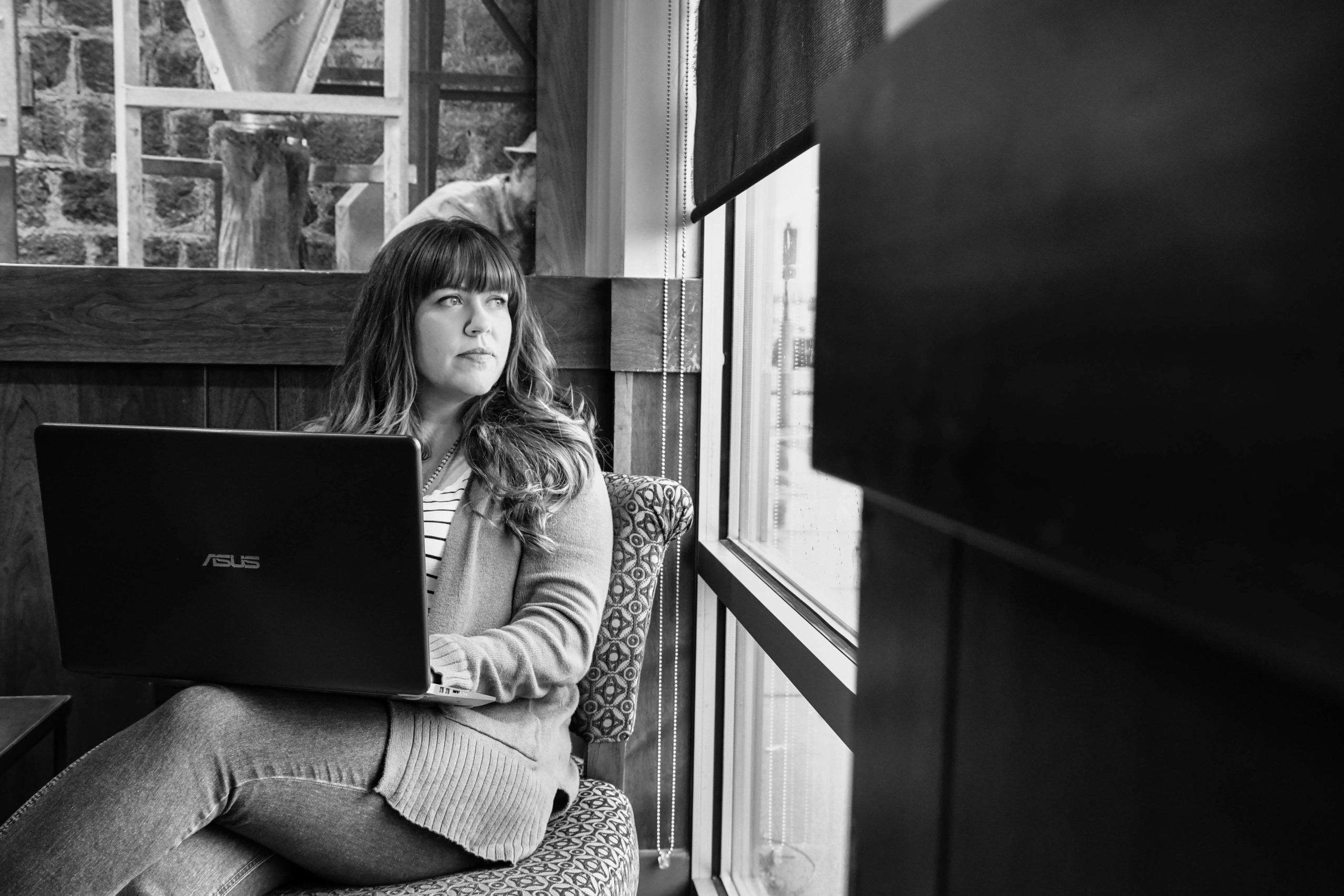 Portrait photography - a woman works on her laptop