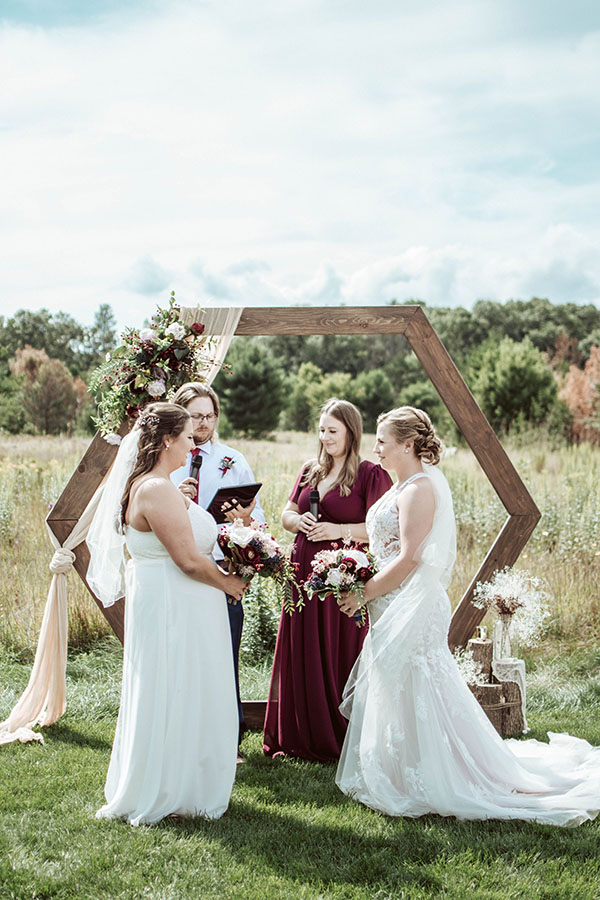 the wedding ceremony of two brides in wisconsin