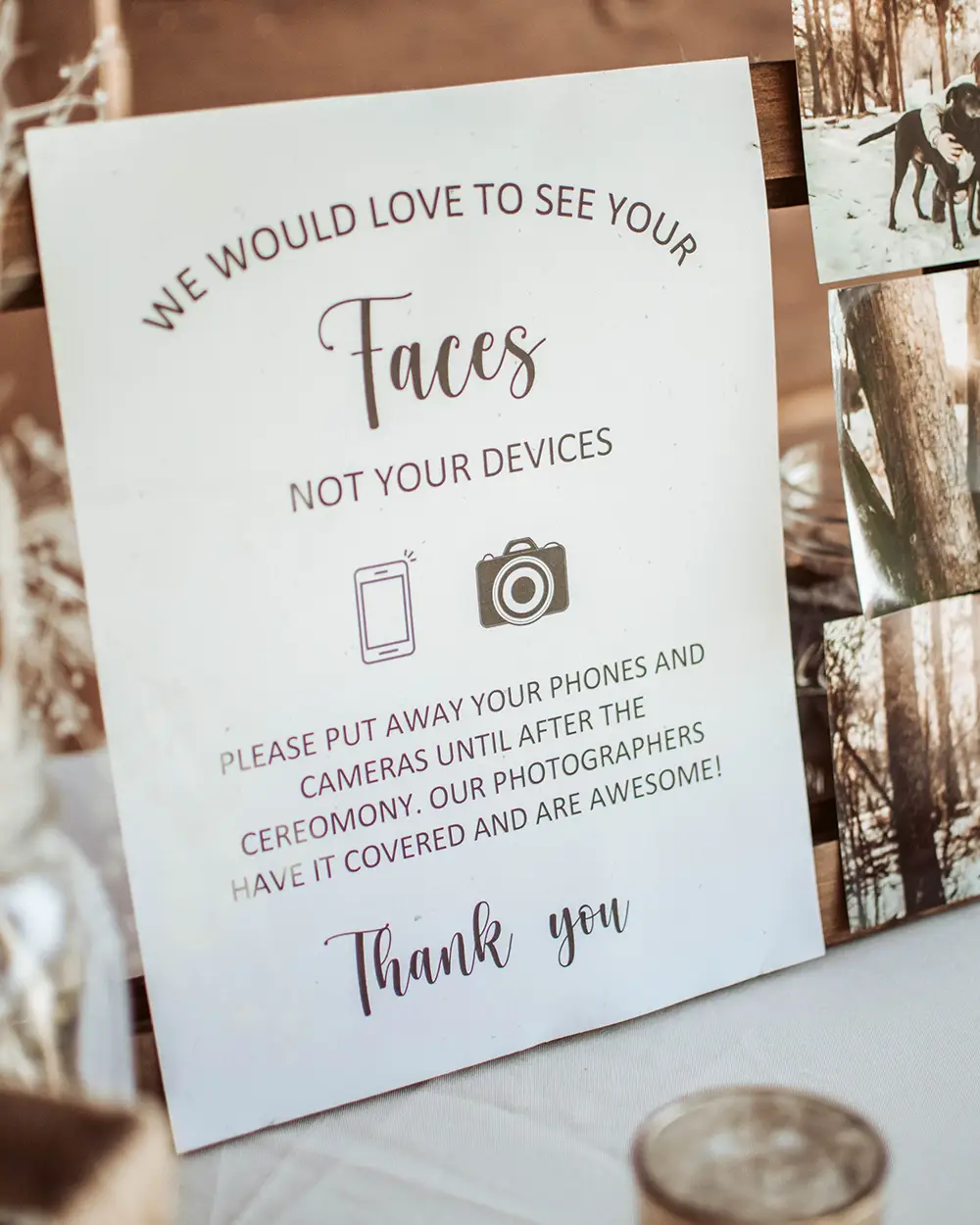 A sign on a table at a wedding reception, reading 